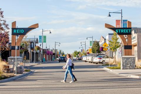 View of Reid Street gateway and people walking across the street